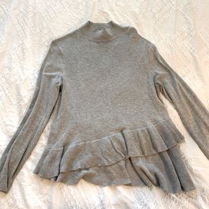 Ruffled long sleeve turtleneck